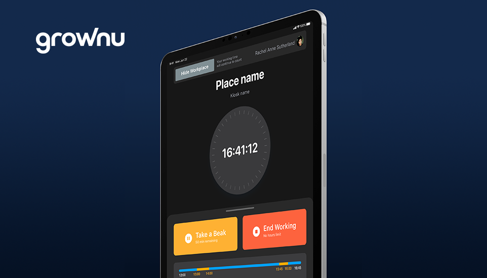 Employee using a tablet to clock in with digital work time tracking software