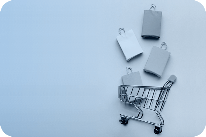Associative photo of the retail industry with shopping cart and purchases