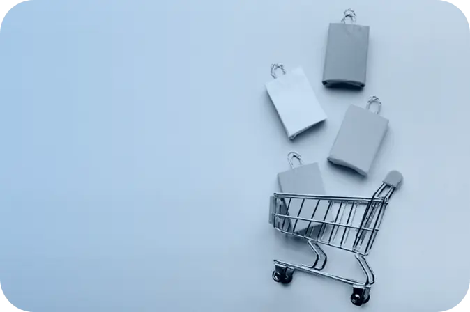 Associative photo of the retail industry with shopping cart and purchases